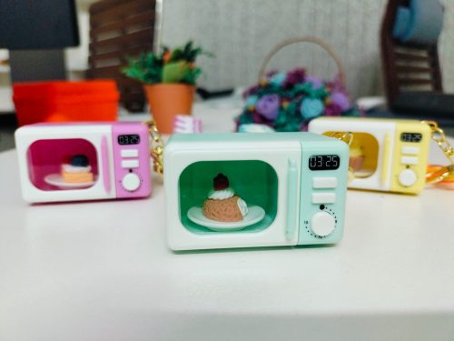 WhatsApp Image 2026-02-21 at 12.21.47 (1) Mini Microwave Oven Keychain with LED Light and Realistic Sound Effects