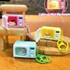 WhatsApp Image 2026-02-21 at 12.21.48 Mini Microwave Oven Keychain with LED Light and Realistic Sound Effects